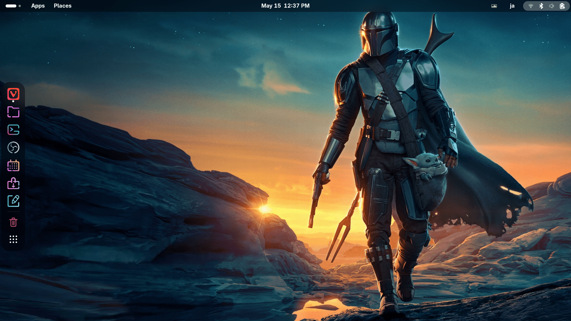 Screenshot of a linux gnome desktop with the wallpaper featuring the mandalorian and grogu.